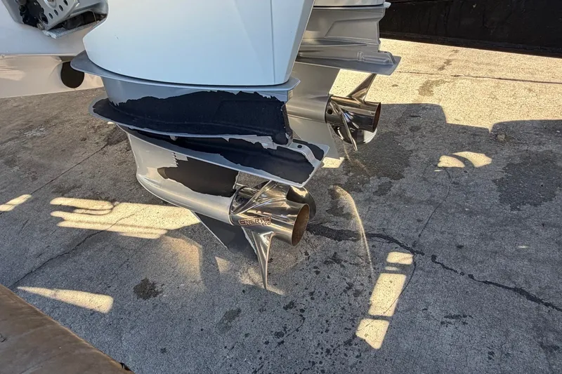 Slide: The Image of Damaged propeller of 2023 Axopar 28 T-Top boat on concrete surface. - 7