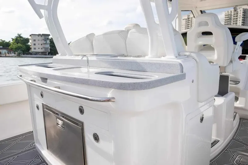 Slide: The Image of Manufacturer Provided Image: 2025 Blackwater 43 Luxury Fish yacht interior with sleek white cabinetry and modern amenities. - 9