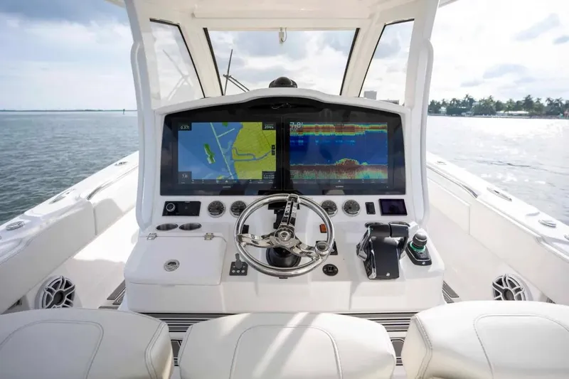 Slide: The Image of Manufacturer Provided Image: 2025 Blackwater 43 Luxury Fish boat cockpit with advanced navigation system and steering wheel. - 6
