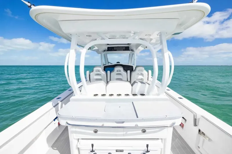 Slide: The Image of Manufacturer Provided Image: 2025 Blackwater 43 Luxury Fish boat on open sea, showcasing sleek design and spacious deck. - 8
