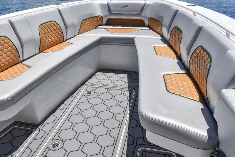 Slide: The Image of Manufacturer Provided Image: Luxurious seating on 2025 Blackwater 36 Sportfish boat with stylish hexagonal patterns. - 2