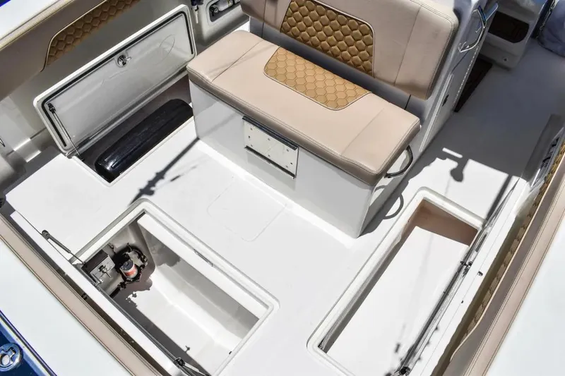 Slide: The Image of Manufacturer Provided Image: 2025 Blackwater 36 Sportfish interior with storage compartments and cushioned seating. - 5