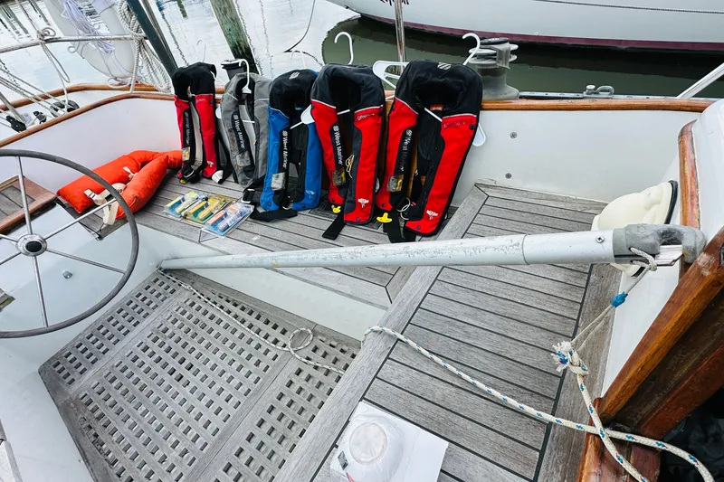 Slide: The Image of Cockpit of 1981 Cape George 36 Cutter with life jackets and safety gear. - 49