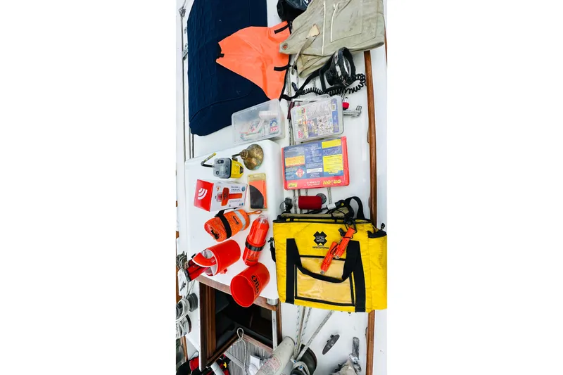 Slide: The Image of Safety equipment and gear on a 1981 Cape George 36 Cutter sailboat. - 50