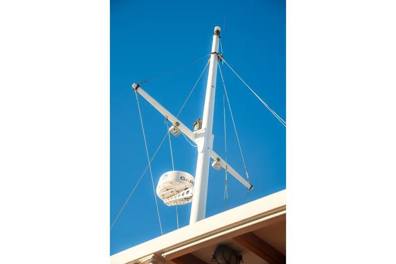 Slide: The Image of Mast of 1922 Blanchard Shipyard Custom boat against clear blue sky. - 17