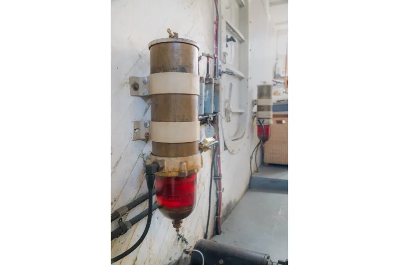 Slide: The Image of 1922 Blanchard Shipyard Custom engine room with vintage machinery and piping. - 82
