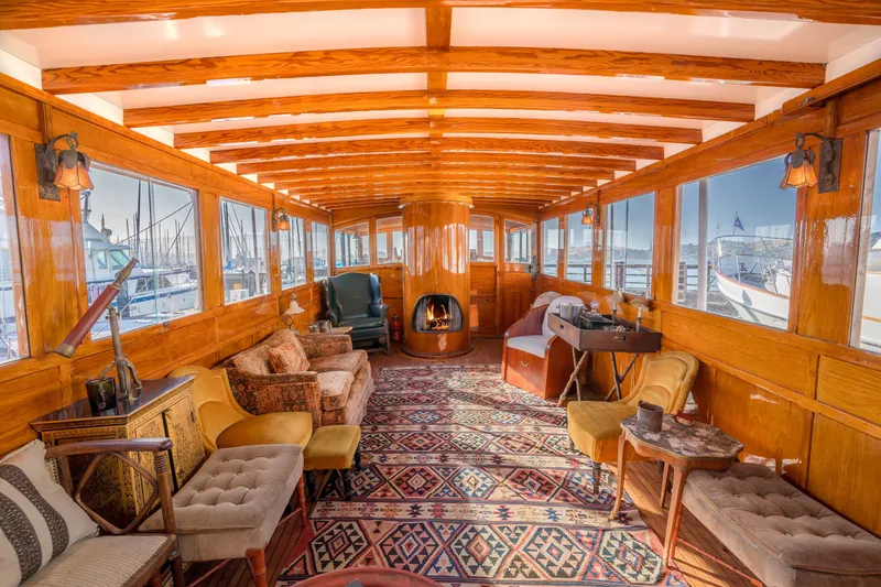 Slide: The Image of Luxurious 1922 Blanchard Shipyard custom yacht interior with vintage decor and panoramic windows. - 4