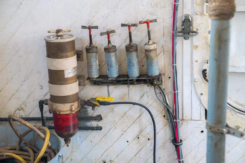 Slide: The Image of Engine room of 1922 Blanchard Shipyard Custom vessel with vintage machinery and wiring. - 79