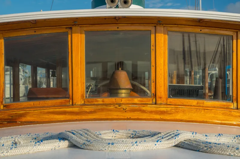 Slide: The Image of Wooden cabin of a 1922 Blanchard Shipyard custom boat with nautical rope. - 18
