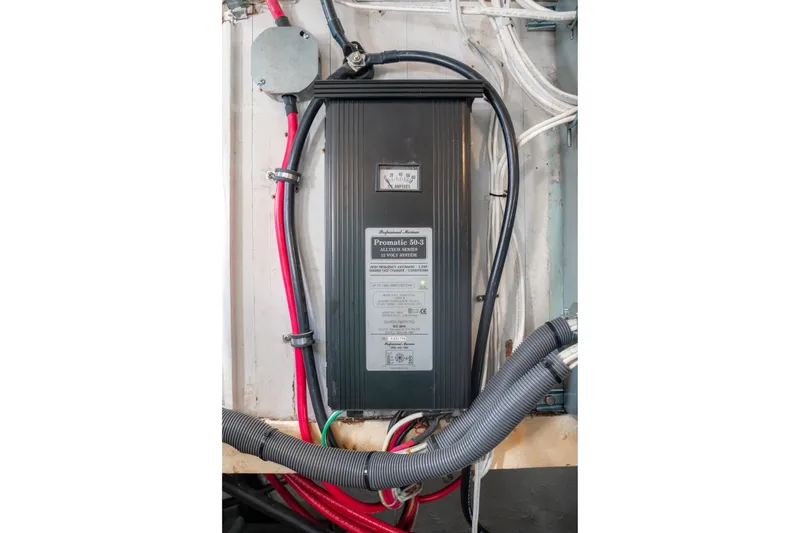 Slide: The Image of Electrical panel with cables on a 1922 Blanchard Shipyard Custom model. - 77