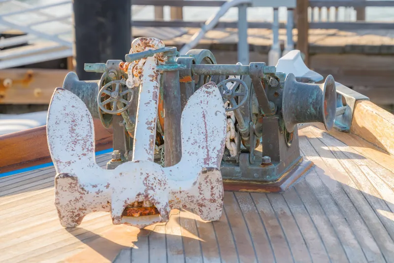 Slide: The Image of Rustic anchor and winch on 1922 Blanchard Shipyard custom boat deck. - 13