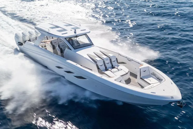 The Image of Manufacturer Provided Image: 2026 Deep Impact 499 Sport boat cruising on open water, showcasing sleek design and powerful engines. - 0