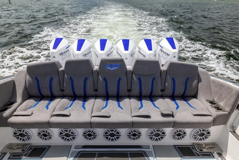 Slide: The Image of Manufacturer Provided Image: 2026 Deep Impact 449 Sport boat with powerful engines and luxurious seating on open water. - 13