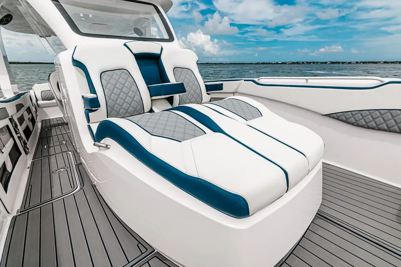 Slide: The Image of Manufacturer Provided Image: Luxurious seating on 2025 Deep Impact 399 Sport boat with ocean view. - 10