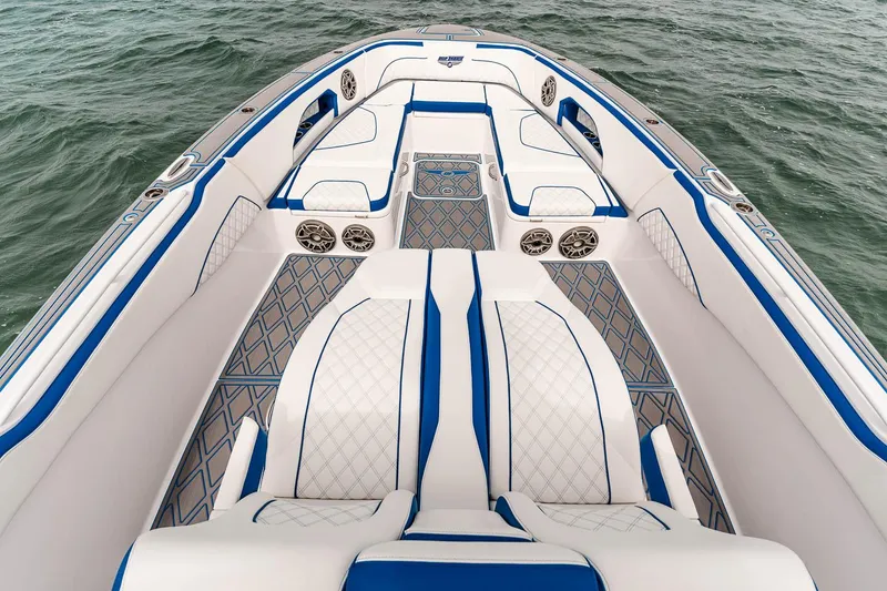 Slide: The Image of Manufacturer Provided Image: Luxurious 2025 Deep Impact 399 Sport boat interior with blue and white seating. - 9