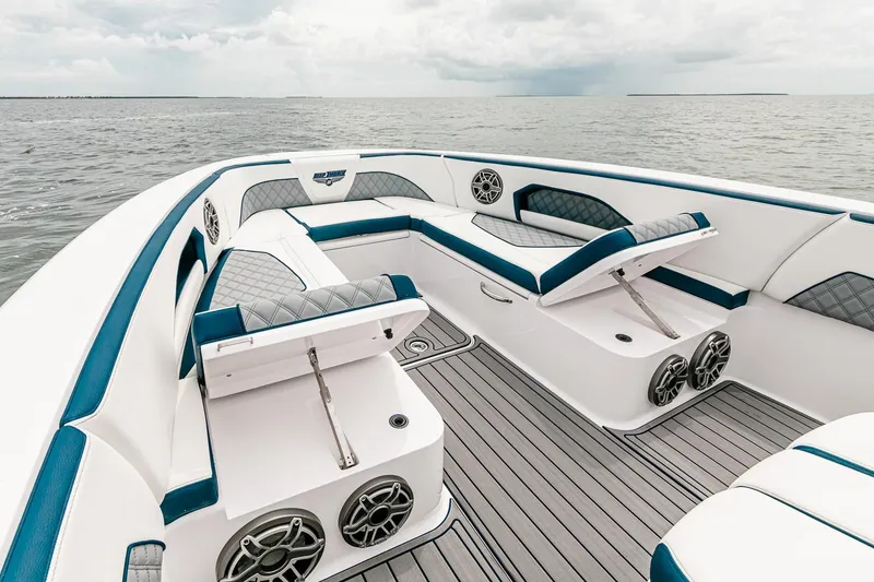 Slide: The Image of Manufacturer Provided Image: 2025 Deep Impact 399 Sport boat interior with luxurious seating and modern design. - 8