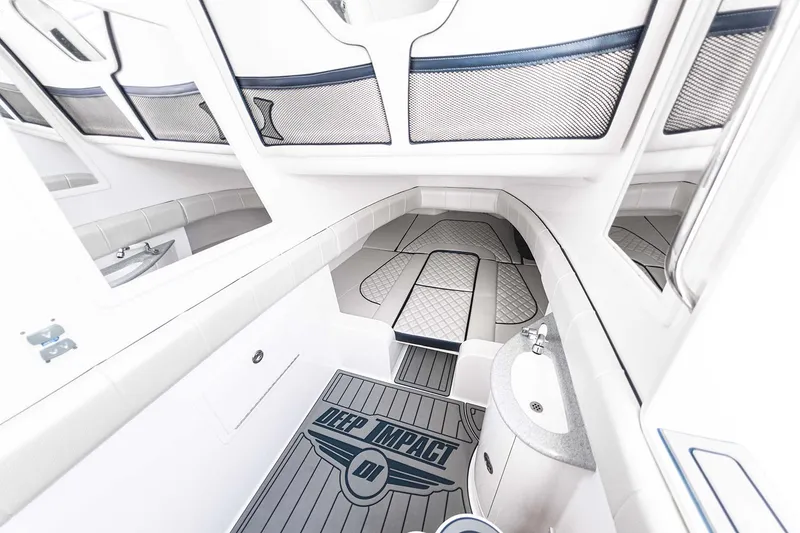 Slide: The Image of Manufacturer Provided Image: Luxurious interior of 2025 Deep Impact 399 Sport boat with modern amenities. - 15
