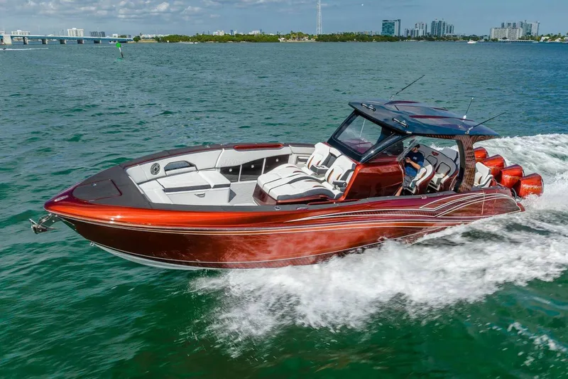 The Image of Manufacturer Provided Image: 2026 Deep Impact 399 Sport boat cruising on open water, showcasing sleek design and powerful engines. - 0