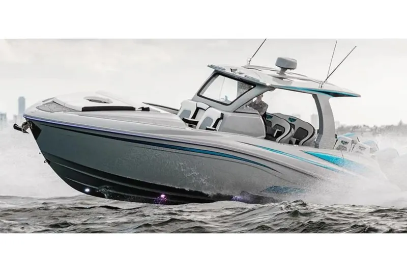 Slide: The Image of Manufacturer Provided Image: 2025 Deep Impact 399 Cabin boat cruising on choppy waters. - 1