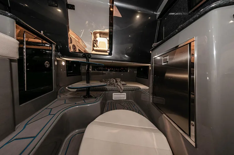 Slide: The Image of Manufacturer Provided Image: Interior of 2025 Deep Impact 399 Cabin boat, featuring sleek design and modern amenities. - 13