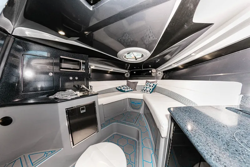 Slide: The Image of Manufacturer Provided Image: Luxurious interior of 2025 Deep Impact 399 Cabin boat with modern amenities and sleek design. - 12