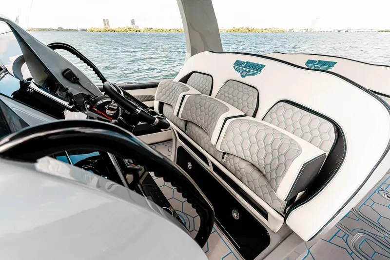 Slide: The Image of Manufacturer Provided Image: Luxury interior of 2025 Deep Impact 399 Cabin boat with plush seating. - 6