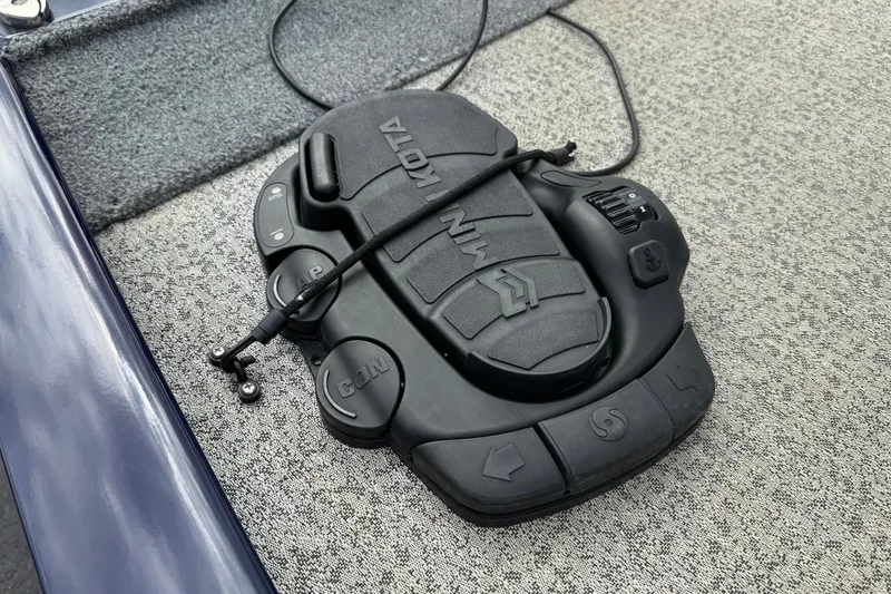 Slide: The Image of Foot pedal control on 2021 Tracker Pro Team 170 TX boat deck. - 21