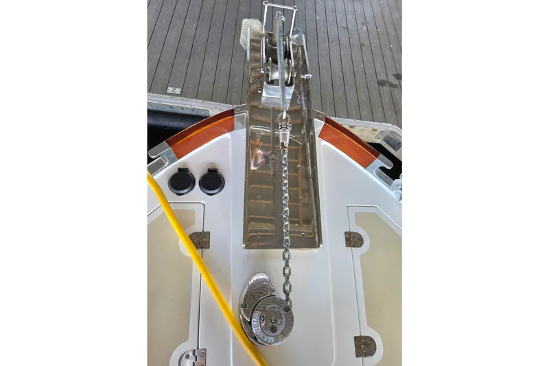 Slide: The Image of Anchor chain mechanism on a 2001 Grand Banks 43 Eastbay HX yacht deck. - 6