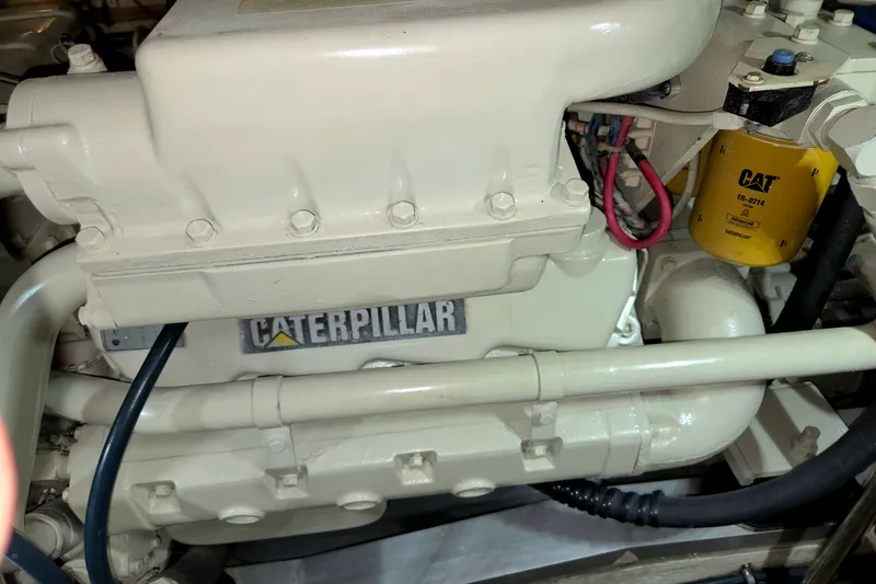 Slide: The Image of Caterpillar engine in 2001 Grand Banks 43 Eastbay HX yacht, featuring CAT filter. - 29