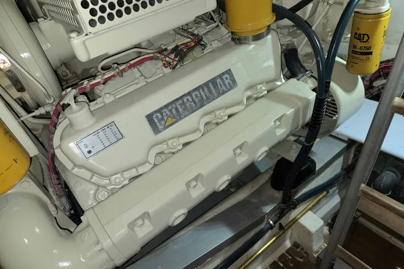 Slide: The Image of Engine compartment of 2001 Grand Banks 43 Eastbay HX with Caterpillar engine. - 28