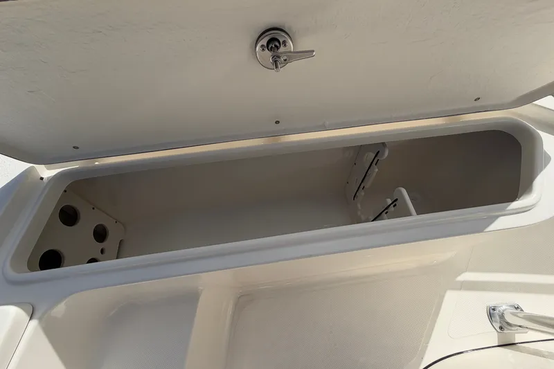 Slide: The Image of Open storage compartment on a 2027 Bulls Bay 2200 XS boat. - 11