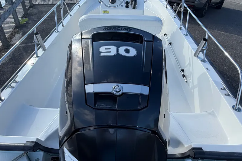 Slide: The Image of 2017 Boston Whaler 170 Montauk with Mercury 90 engine, docked and ready for use. - 19