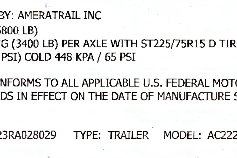 Slide: The Image of Ameratrail trailer label for 2024 Young Boats 26 Gulfshore, detailing weight and tire specifications. - 32