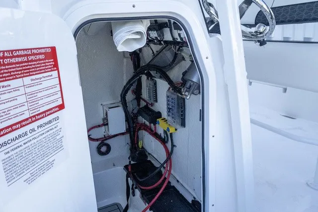 Slide: The Image of Interior view of a boat with electrical connections and wiring. - 5
