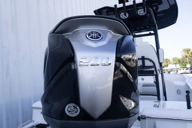 Slide: The Image of A modern outboard motor on a 2027 Tidewater 2210 Carolina Bay boat. - 14