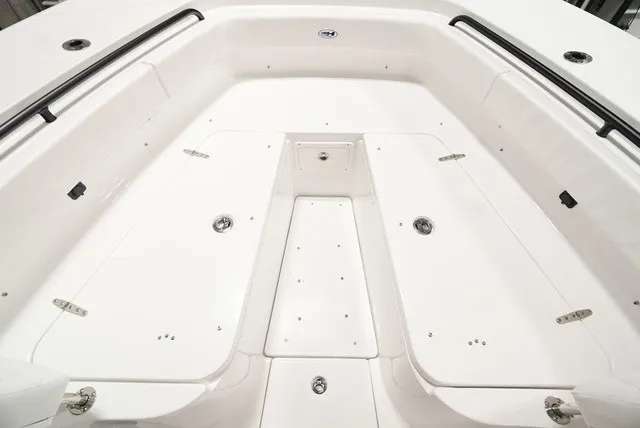 Slide: The Image of The image shows the spacious bow area of a 2027 Sea Hunt Ultra 285SE boat. - 15