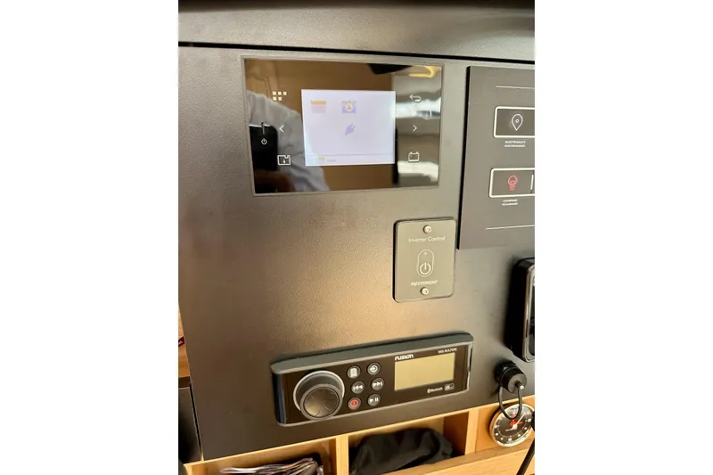 Slide: The Image of Control panel of 2024 Jeanneau Sun Odyssey 410 yacht with touchscreen and audio system. - 52