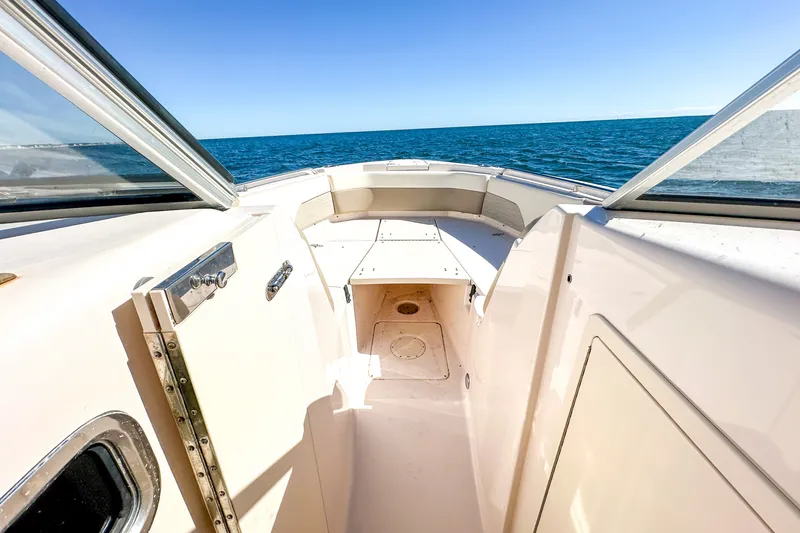 Slide: The Image of 2014 Grady-White Freedom 307 boat interior with ocean view. - 19