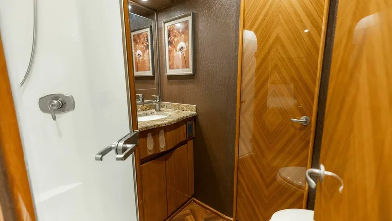 Slide: The Image of 2013 Viking 76 Convertible- REEL FIRE- Forward VIP Stateroom Head - 42