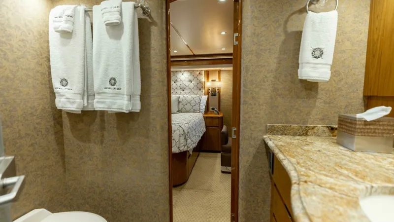 Slide: The Image of 2013 Viking 76 Convertible- REEL FIRE- Master Stateroom Head - 32