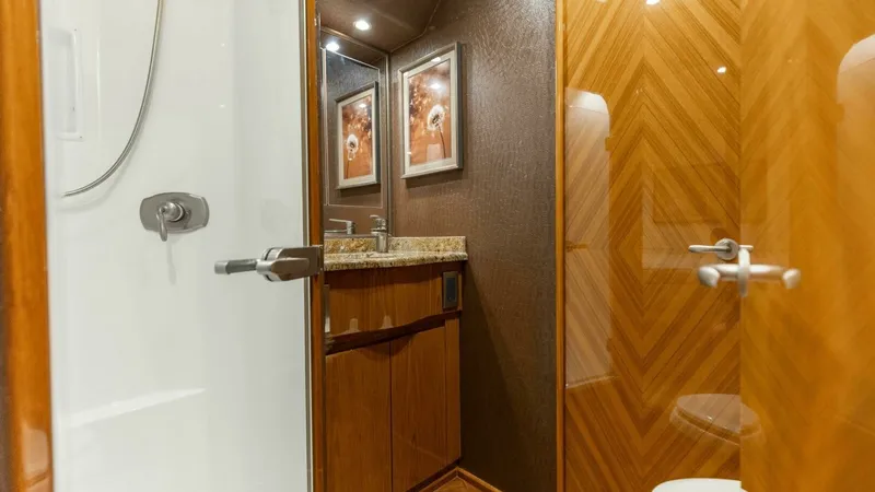 Slide: The Image of 2013 Viking 76 Convertible- REEL FIRE- Forward VIP Stateroom Head - 43
