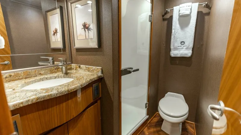 Slide: The Image of 2013 Viking 76 Convertible- REEL FIRE- Starboard Stateroom Head - 49