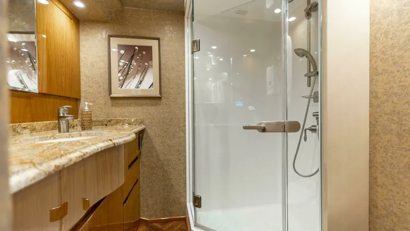 Slide: The Image of 2013 Viking 76 Convertible- REEL FIRE- Master Stateroom Head - 30