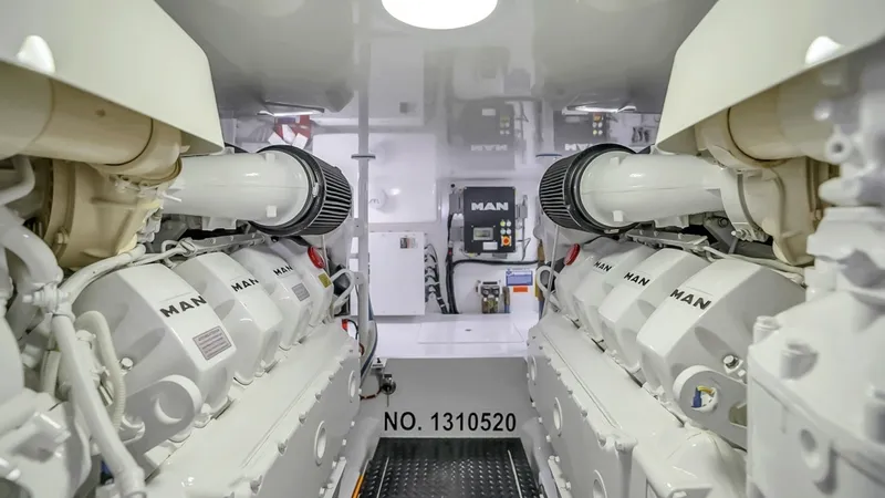 Slide: The Image of Engine Room with Twin MAN Engines - 65