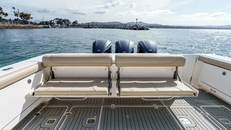 Slide: The Image of 2018 Pursuit 385 Offshore "TAG TEAM" - Spacious Aft Deck with Seating - 4