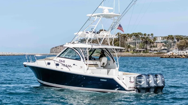 Slide: The Image of 2018 Pursuit 385 Offshore "TAG TEAM" - Aft View with Triple Outboards - 31