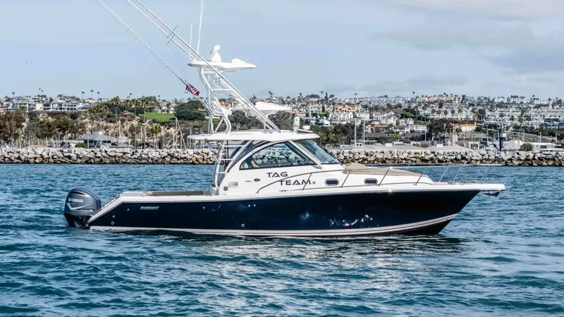 The Image of 2018 Pursuit 385 Offshore "TAG TEAM" - Starboard Profile in Coastal Waters - 1