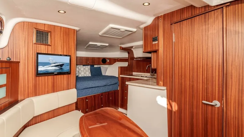Slide: The Image of 2018 Pursuit 385 Offshore "TAG TEAM" - Interior Salon with Galley and Lounge - 5