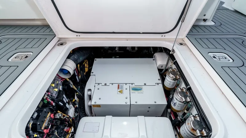 Slide: The Image of 2018 Pursuit 385 Offshore "TAG TEAM" - Engine Compartment Access Hatch - 17
