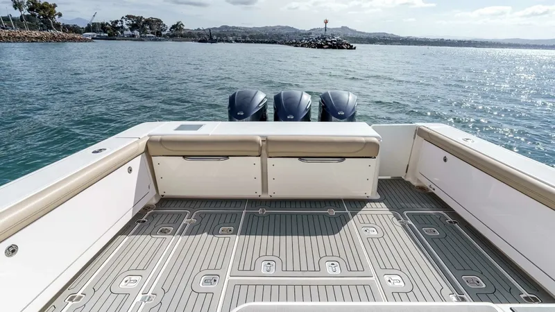 Slide: The Image of 2018 Pursuit 385 Offshore "TAG TEAM" - Spacious Cockpit with Triple Engines - 14